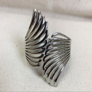 Silver tone wing shaped hinged Bangle Bracelet